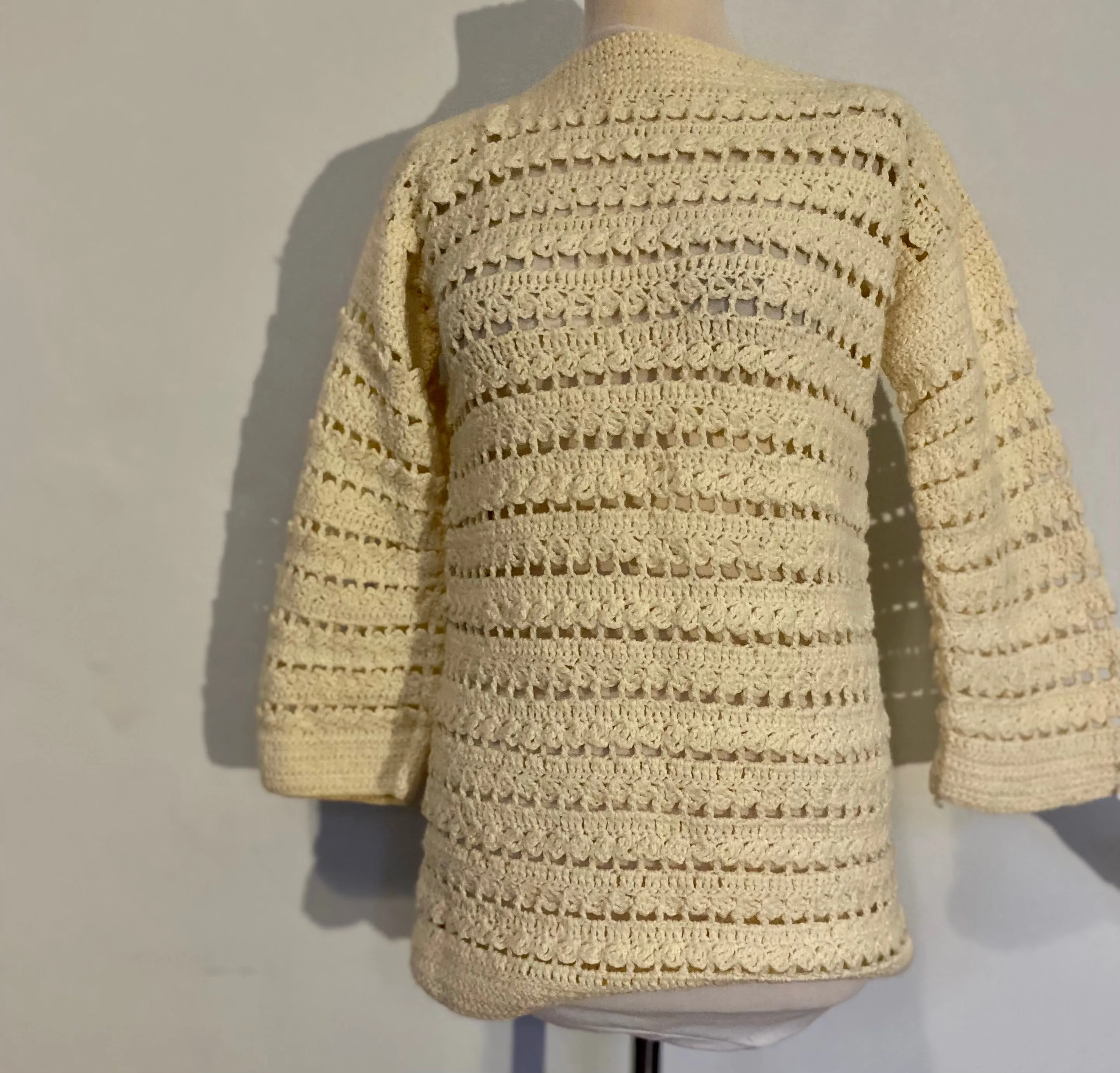 Cream crochet bell sleeve top